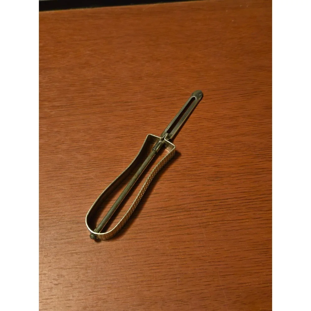 Vintage Metal Swivel Blade Potato Peeler Textured Handle Silver Tone